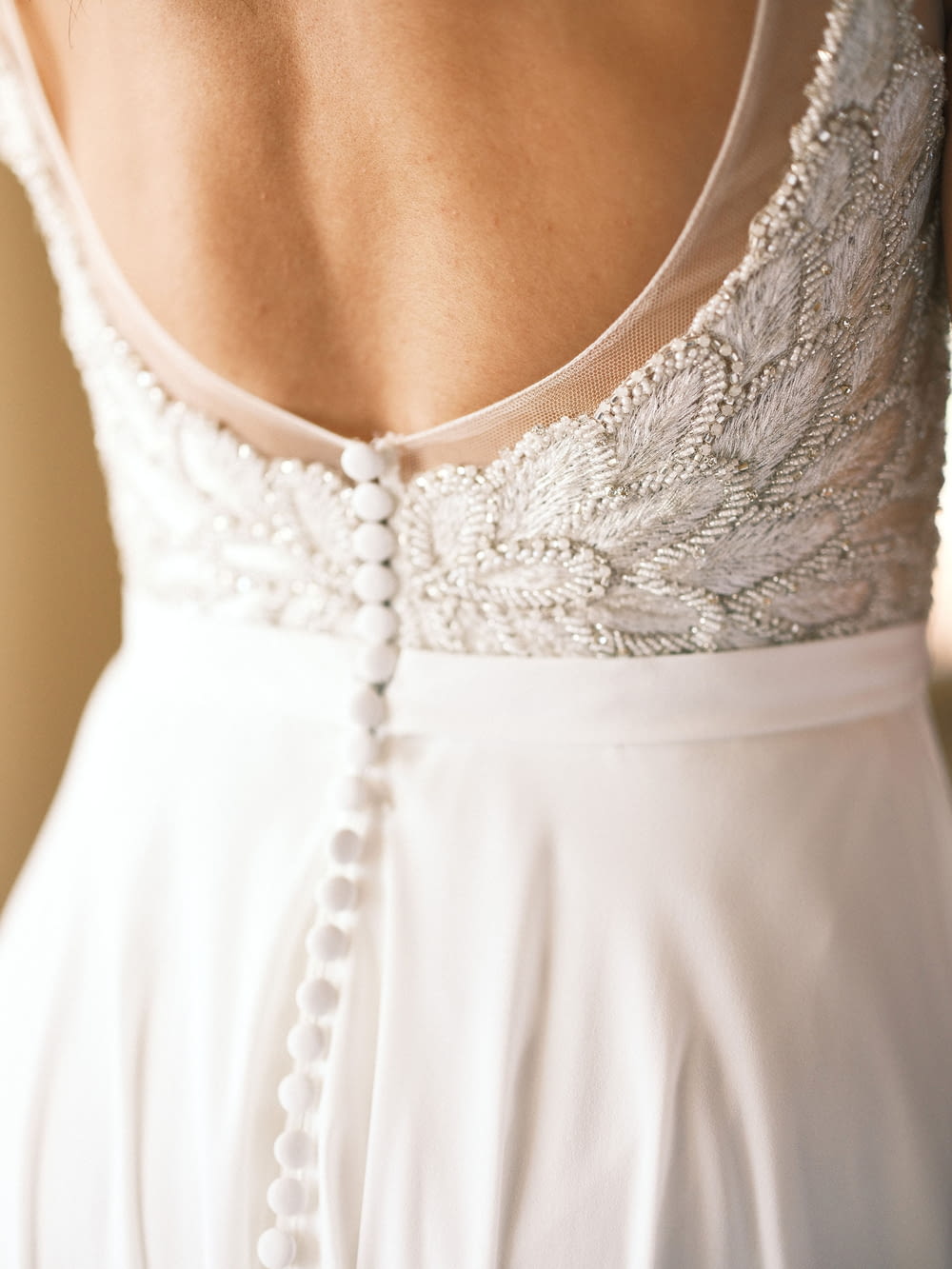 a person wearing a white dress