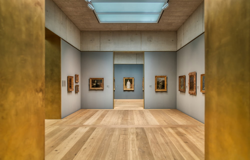 a room with paintings on the walls