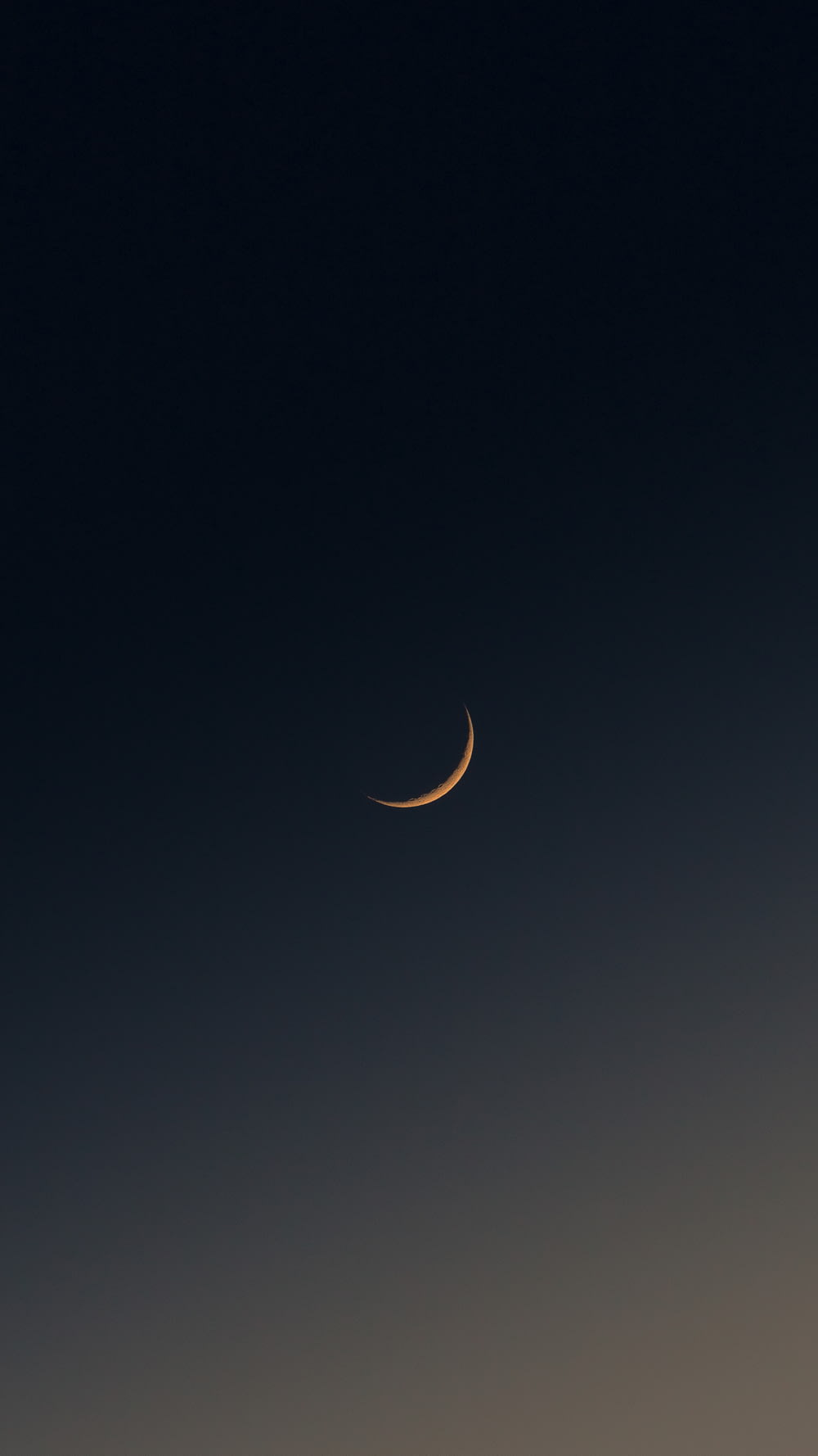 a crescent moon in the sky
