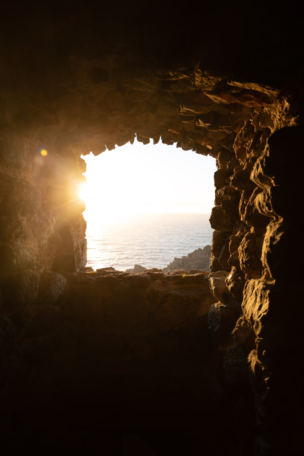 a cave with a light at the end