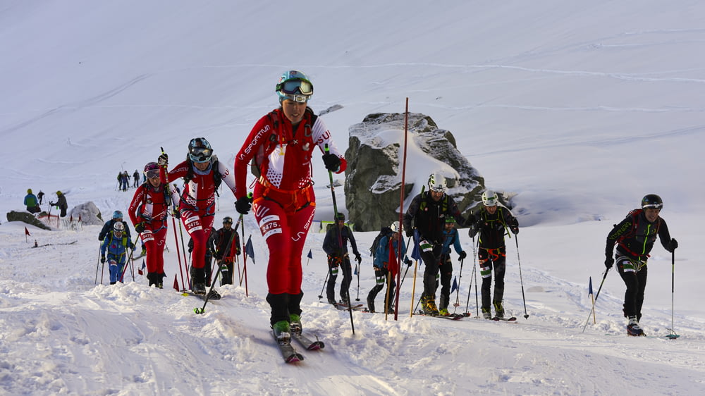 a group of skiers on a snowy mountain