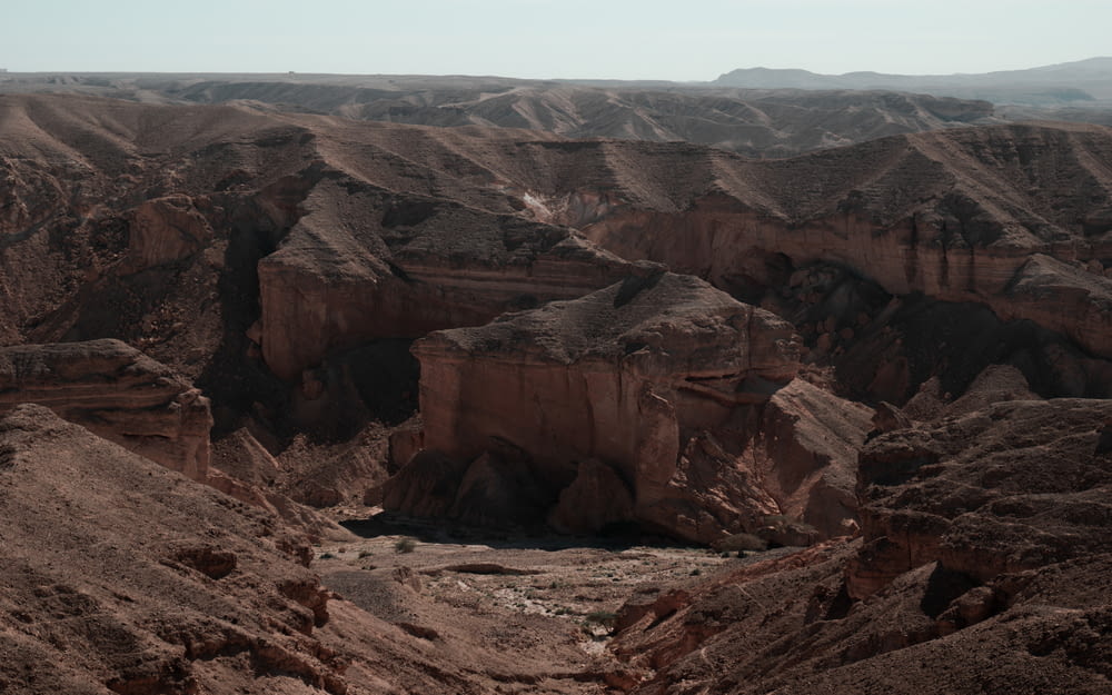 a view of a canyon in the middle of the desert