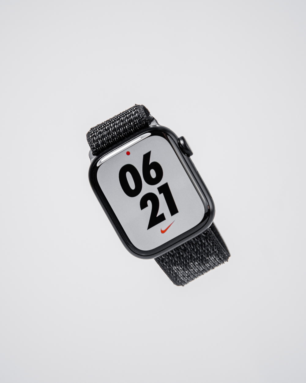 an apple watch with a nike logo on it