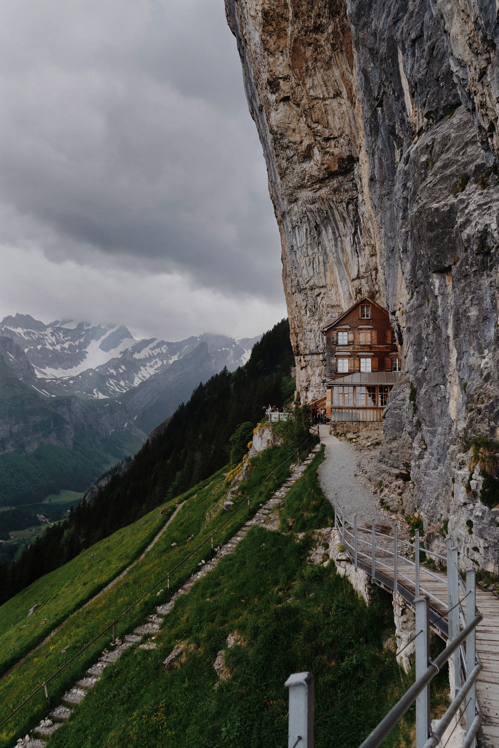 a house on the side of a cliff