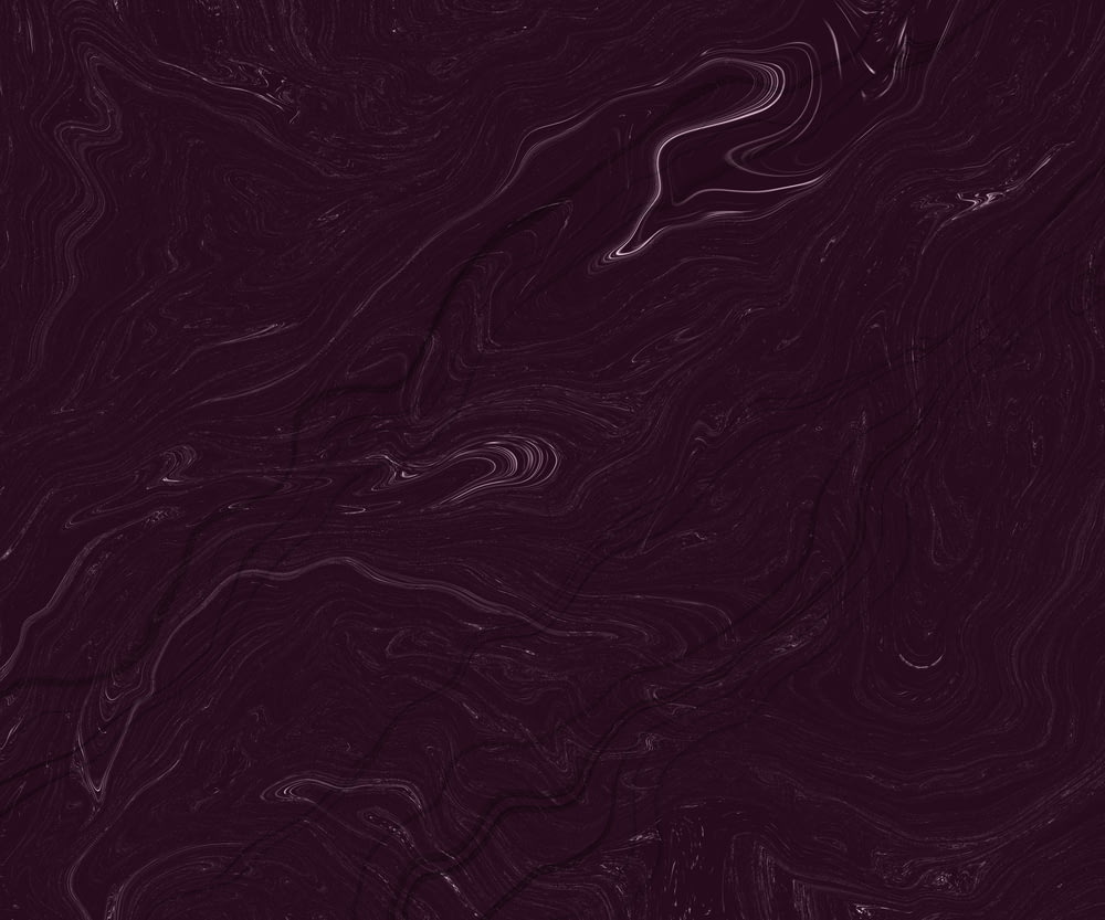 a dark purple background with wavy lines