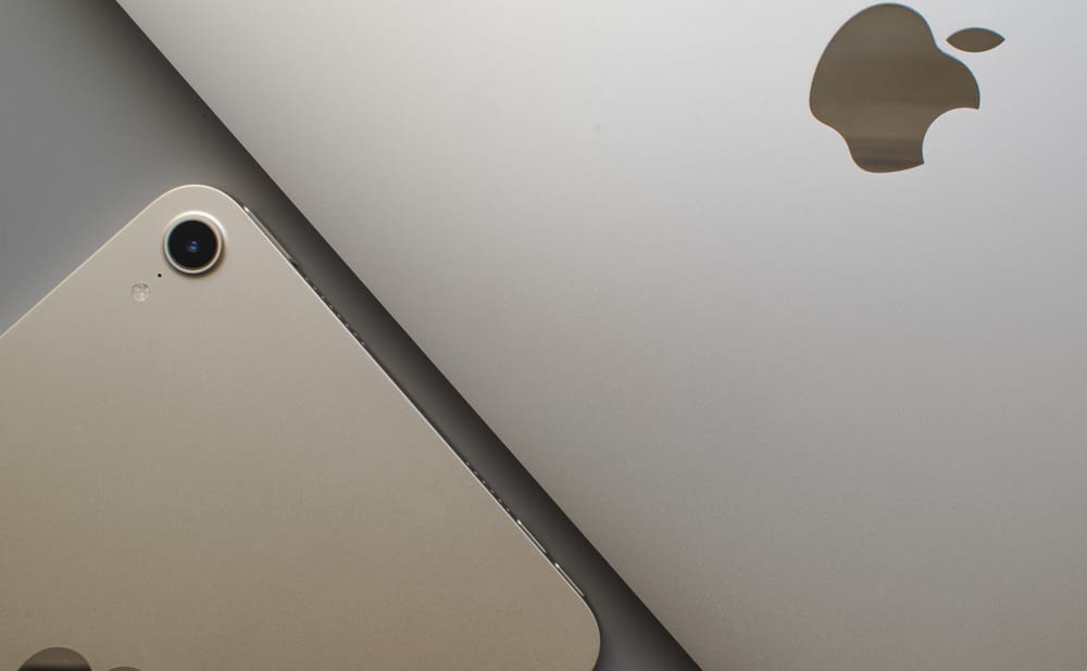 a close up of an apple laptop computer