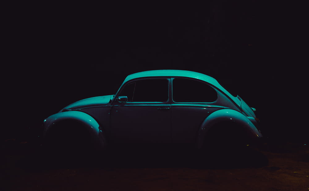 a car is glowing in the dark at night