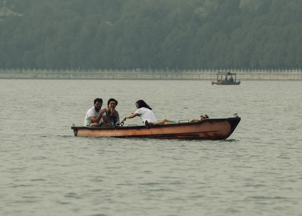 a group of people in a boat