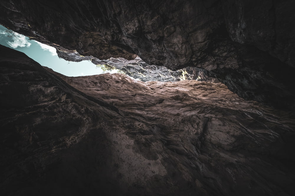 a cave with a light at the end