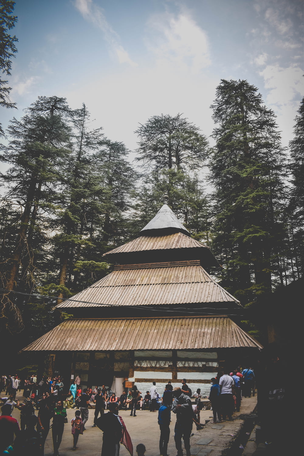 a pagoda with many people around it