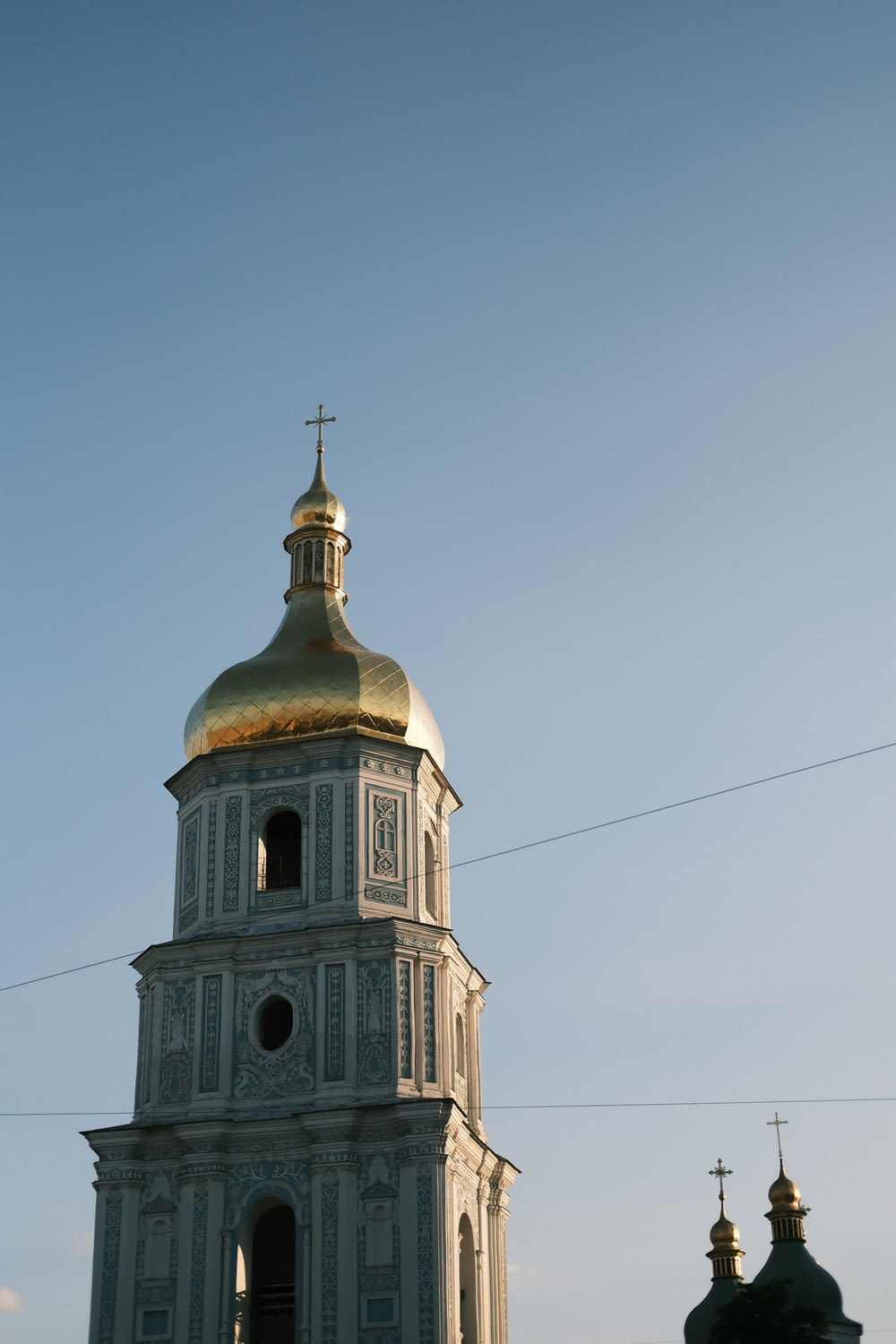 a building with a gold domed roof