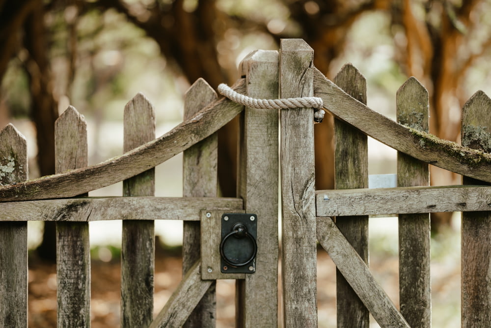 a camera on a wooden fence