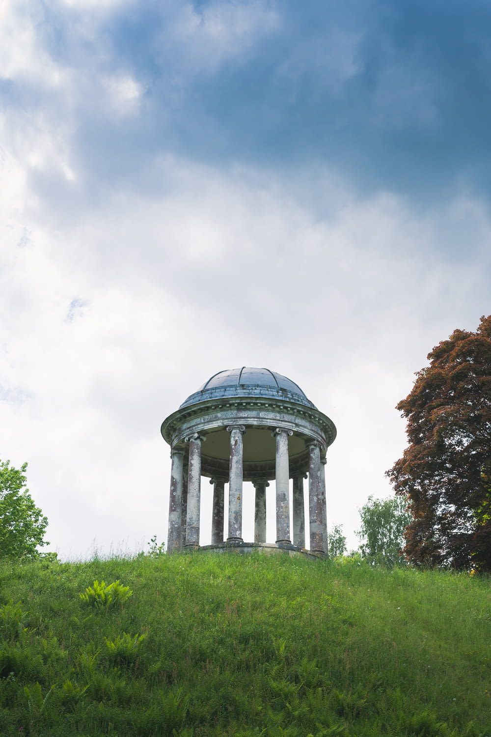 a round structure with columns and a dome on top of it