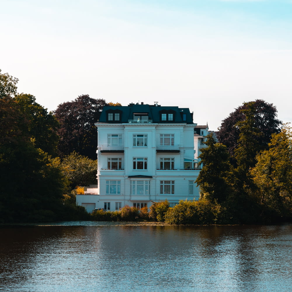 a large house by a body of water