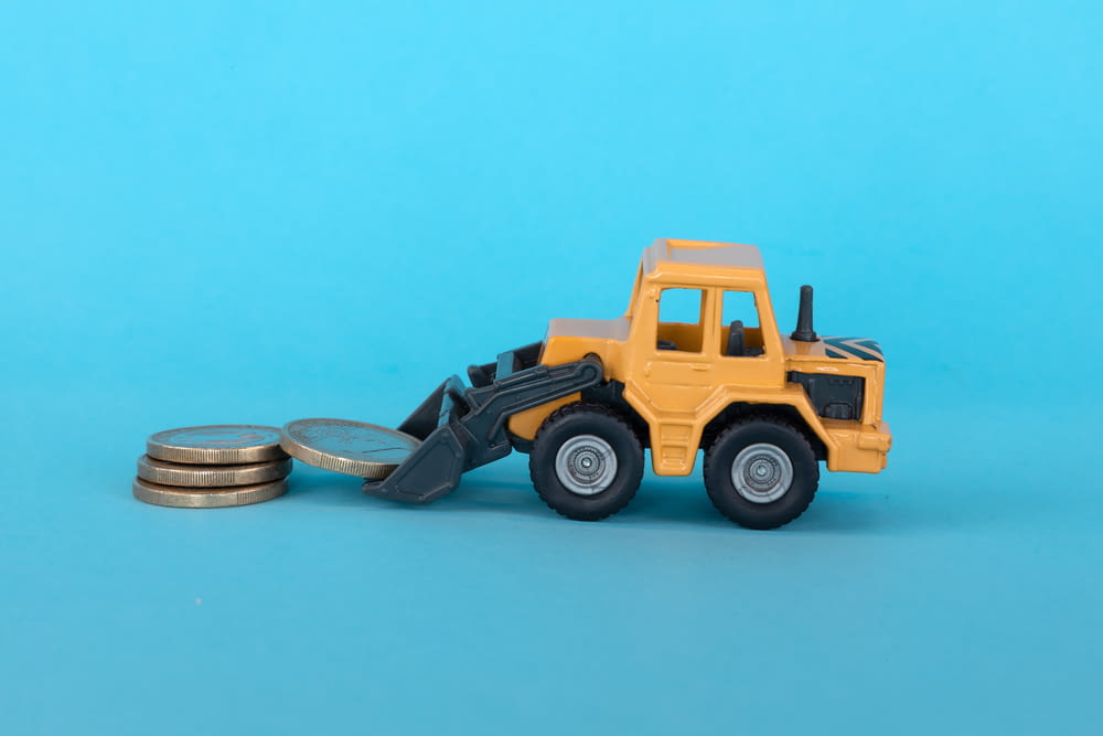 a toy truck with a large tire