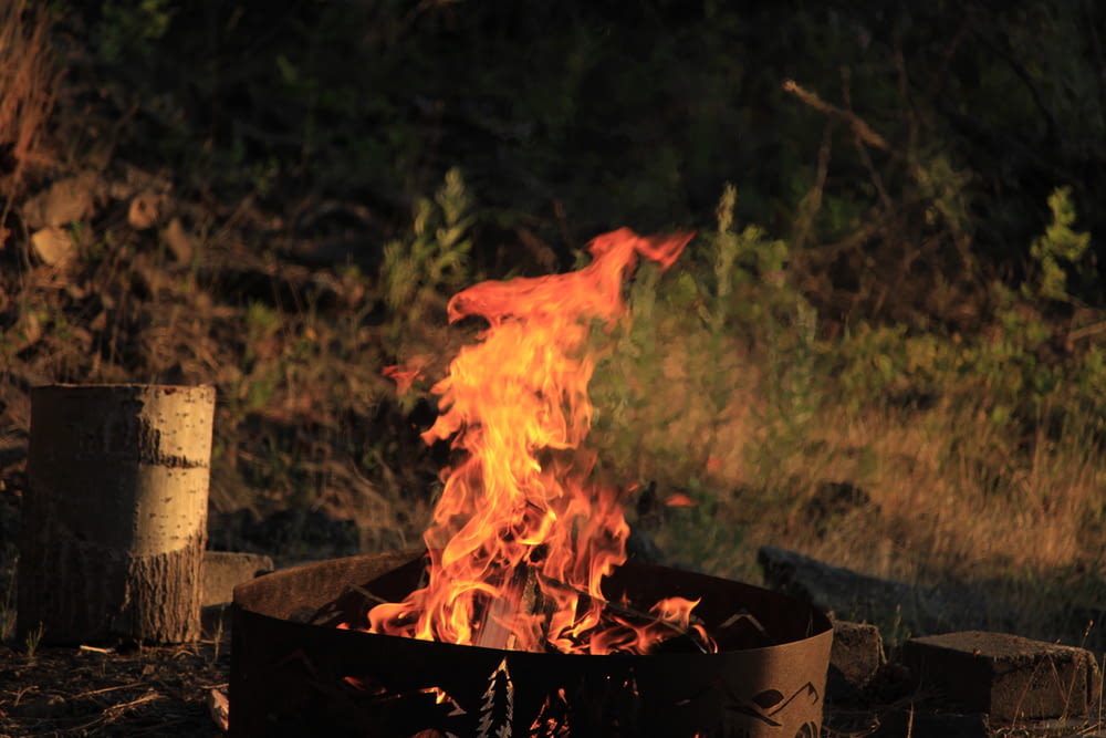 a fire burning in a wood box