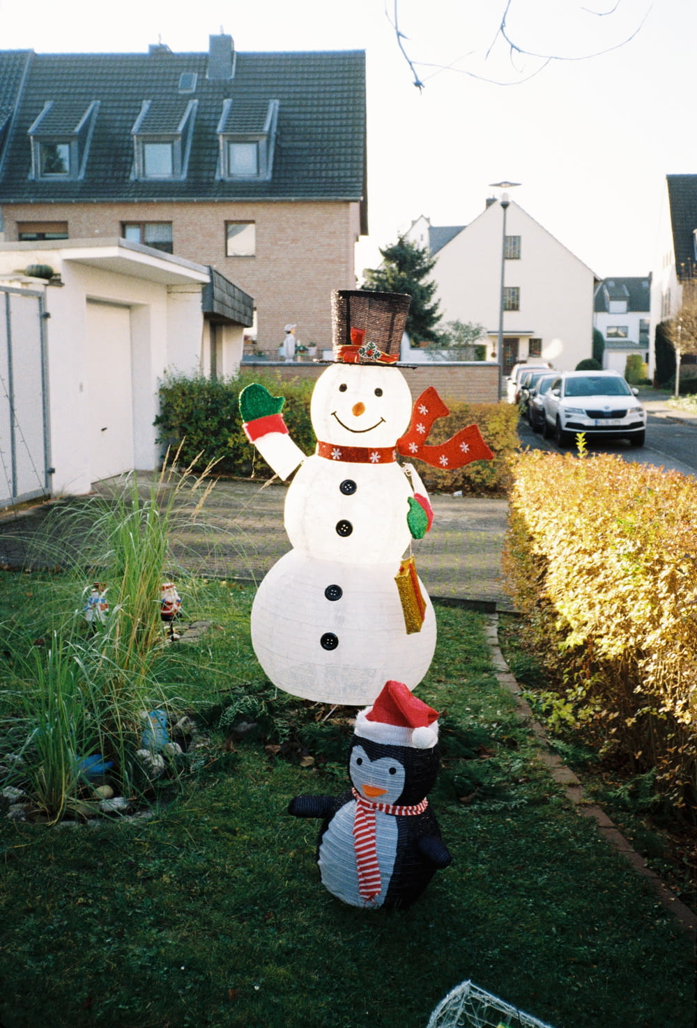 a snowman in a yard
