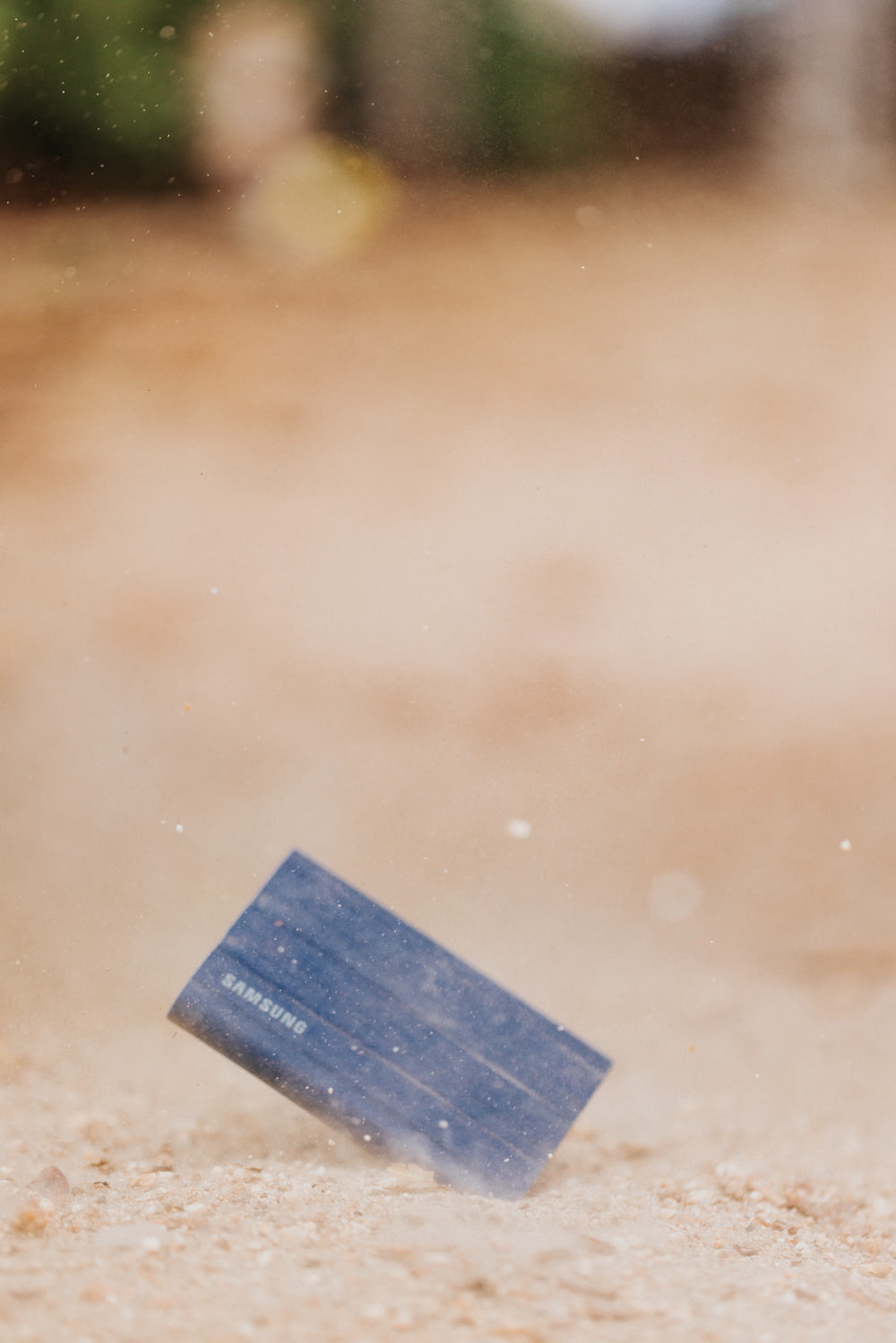a blue rectangular object on a surface