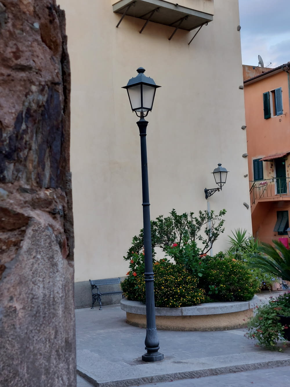 a lamp post in front of a building