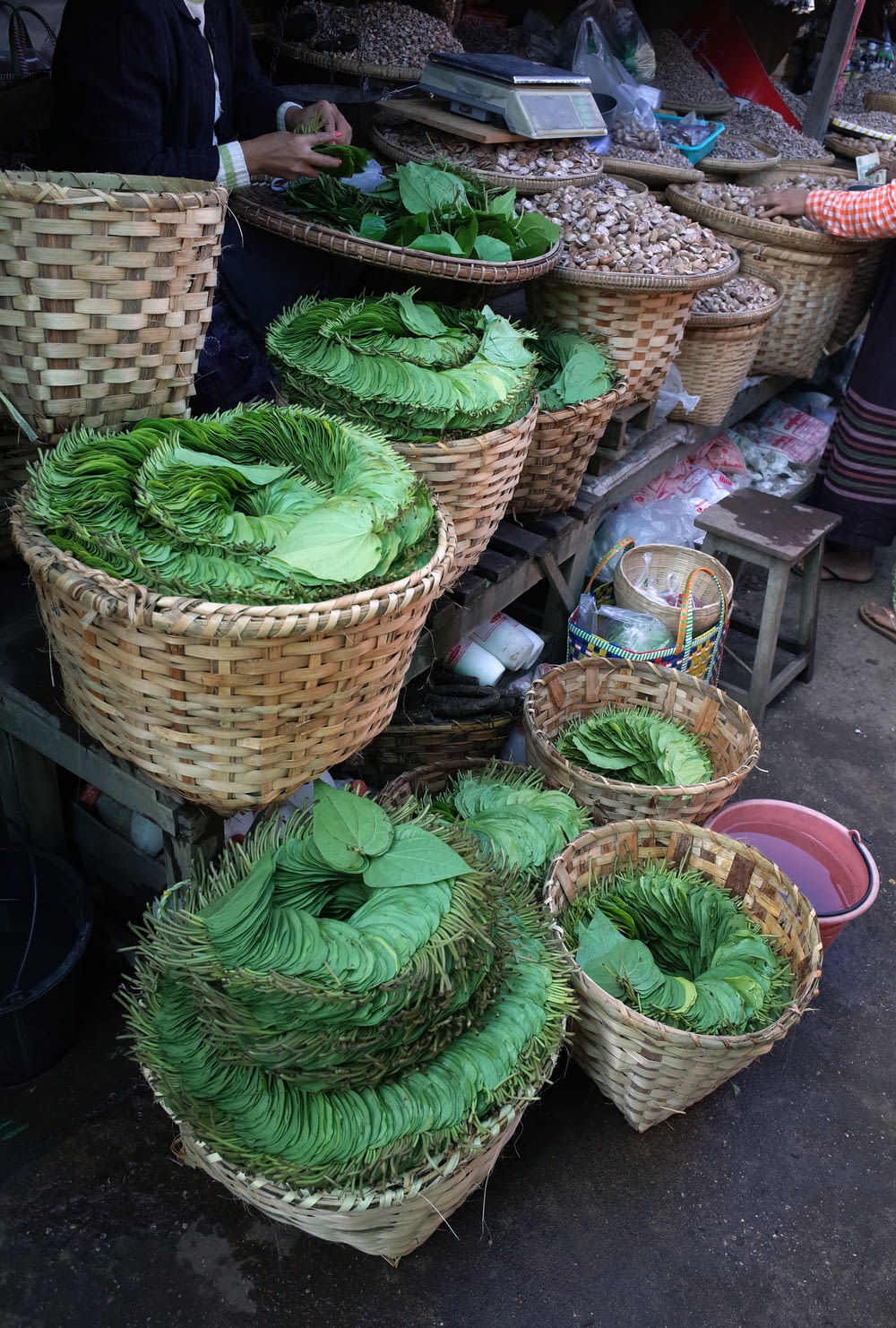 a group of baskets full of vegetables