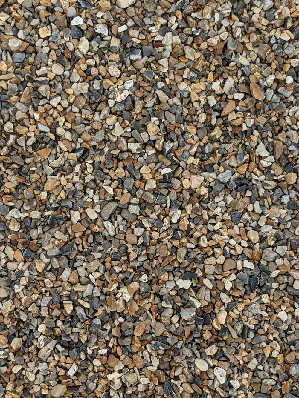 a close up of a pile of small rocks