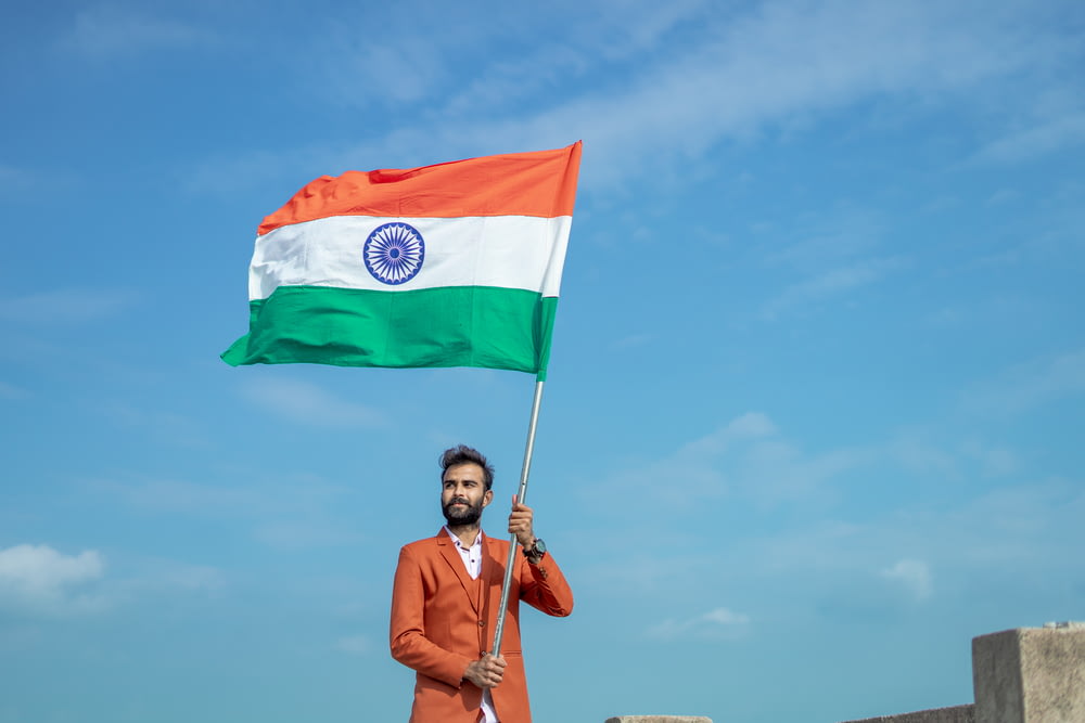 a man holding a flag