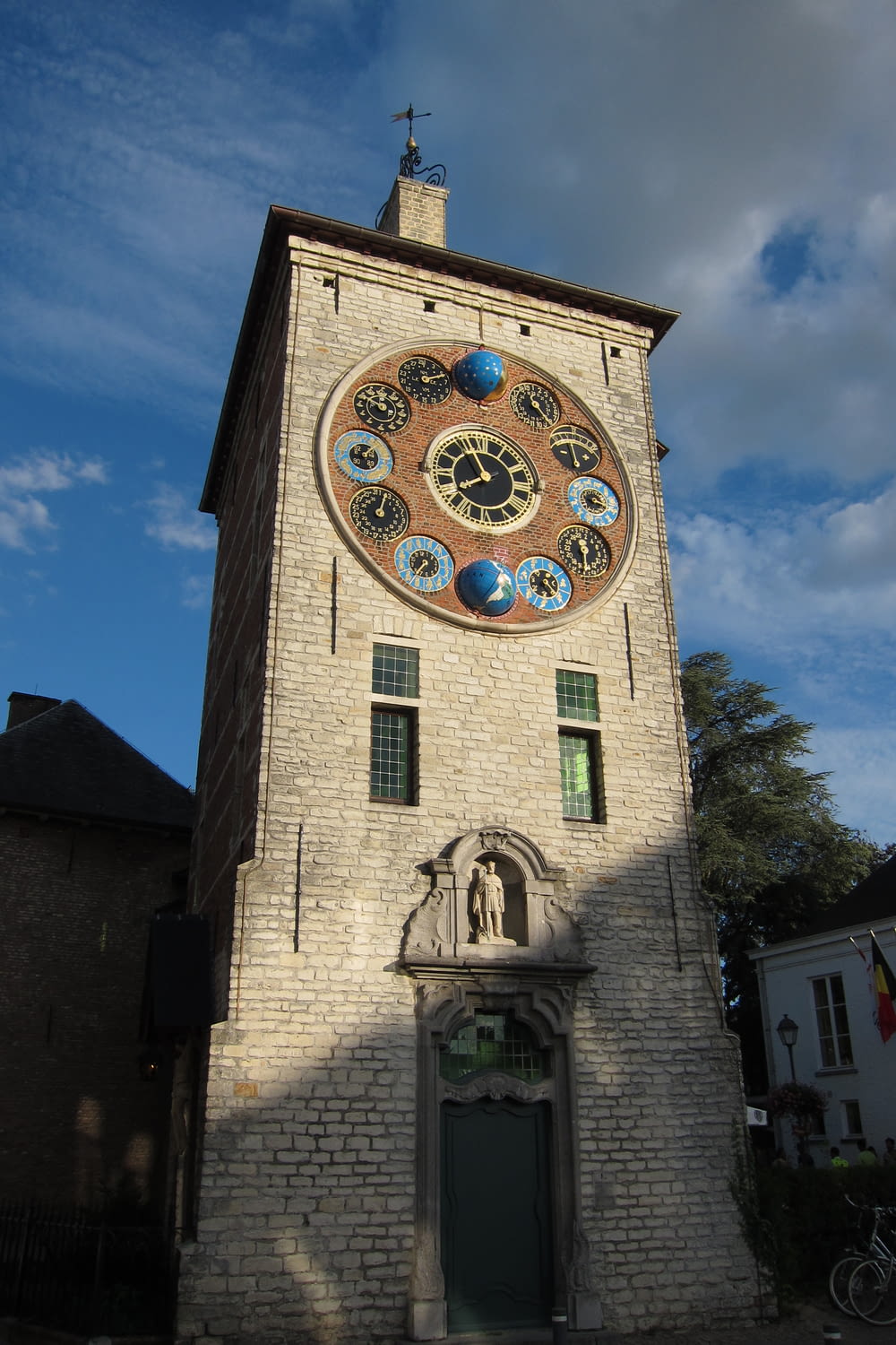 a large clock on a brick building