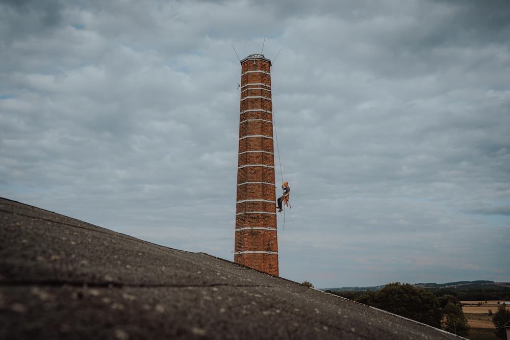 a tower with a person standing on it