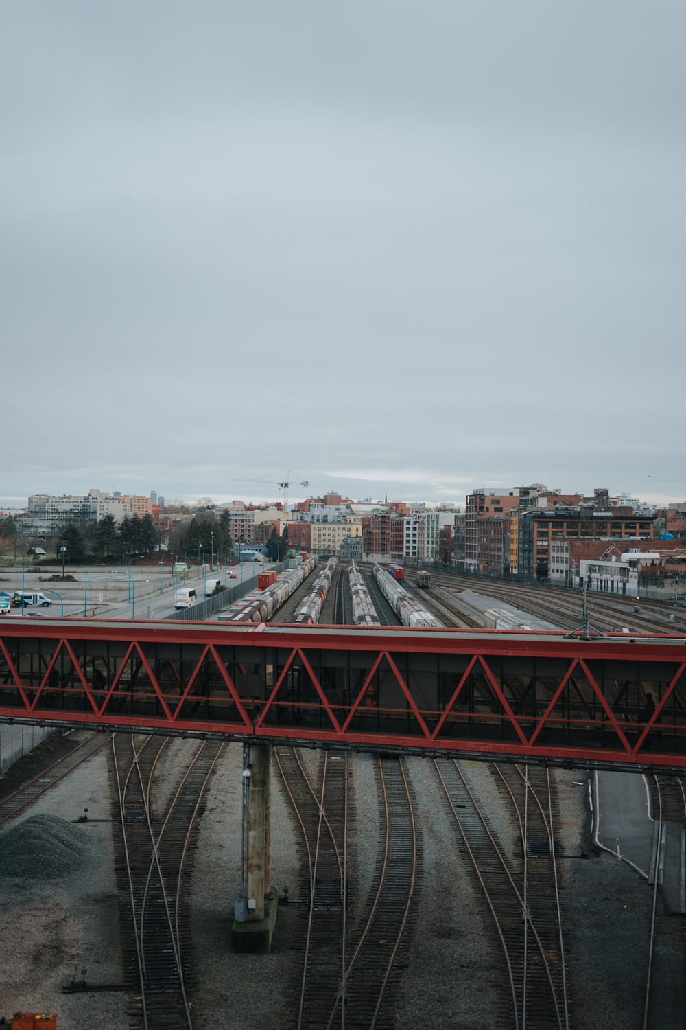 a train track with a city in the background