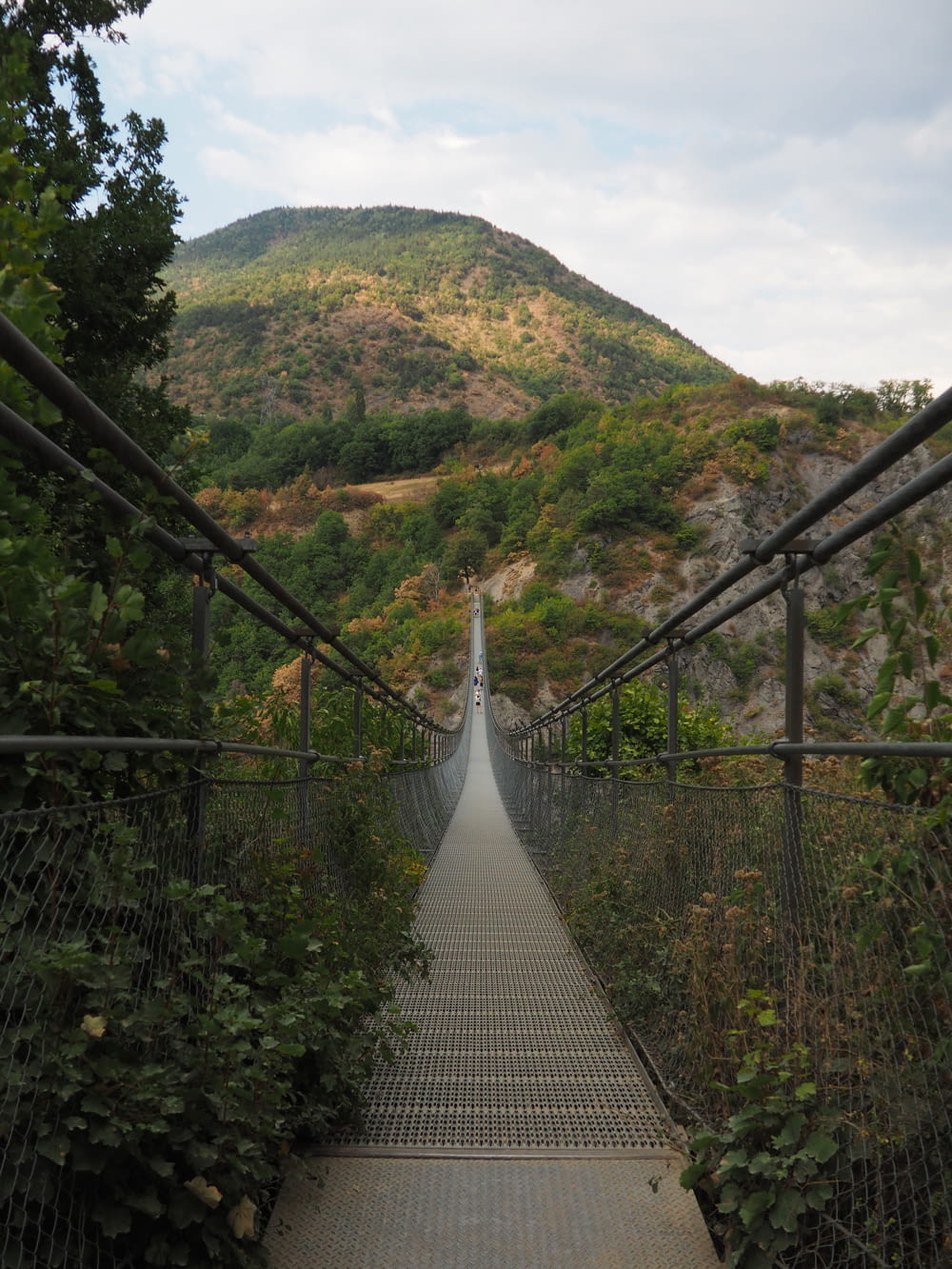 a long suspension bridge over a river