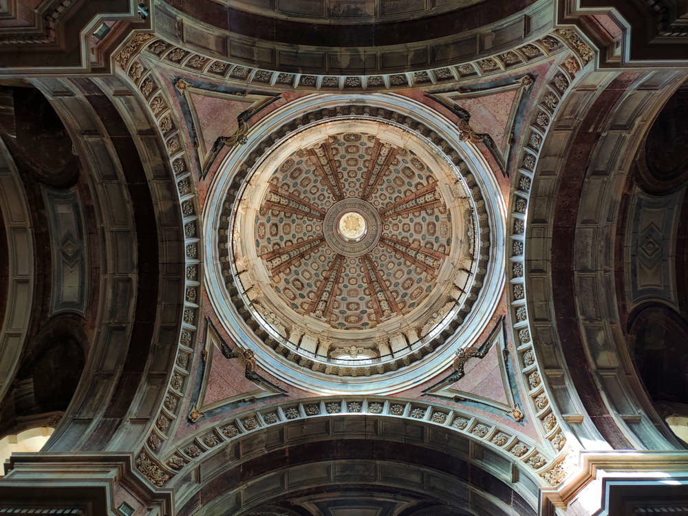 a domed ceiling with a design