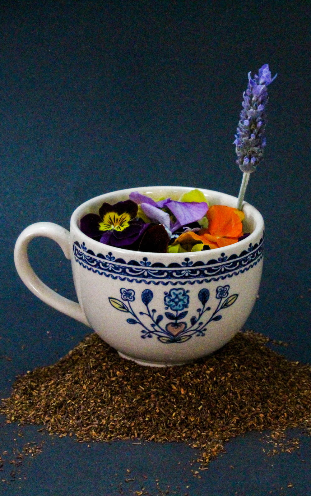 a cup with a flower design
