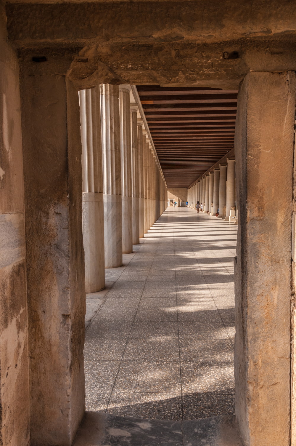 a hallway with columns