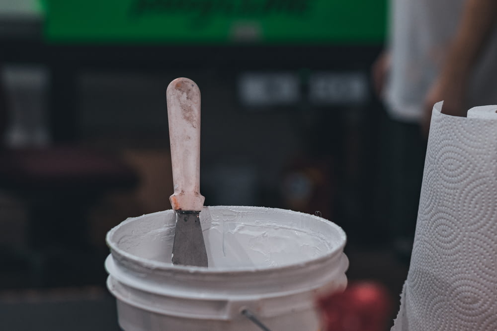 a wooden spoon in a cup