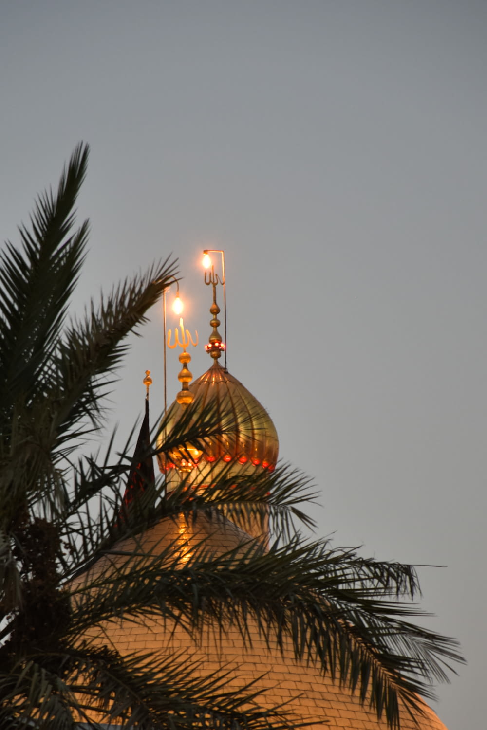 a domed building with a gold roof