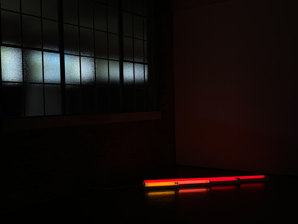 a red light in a dark room