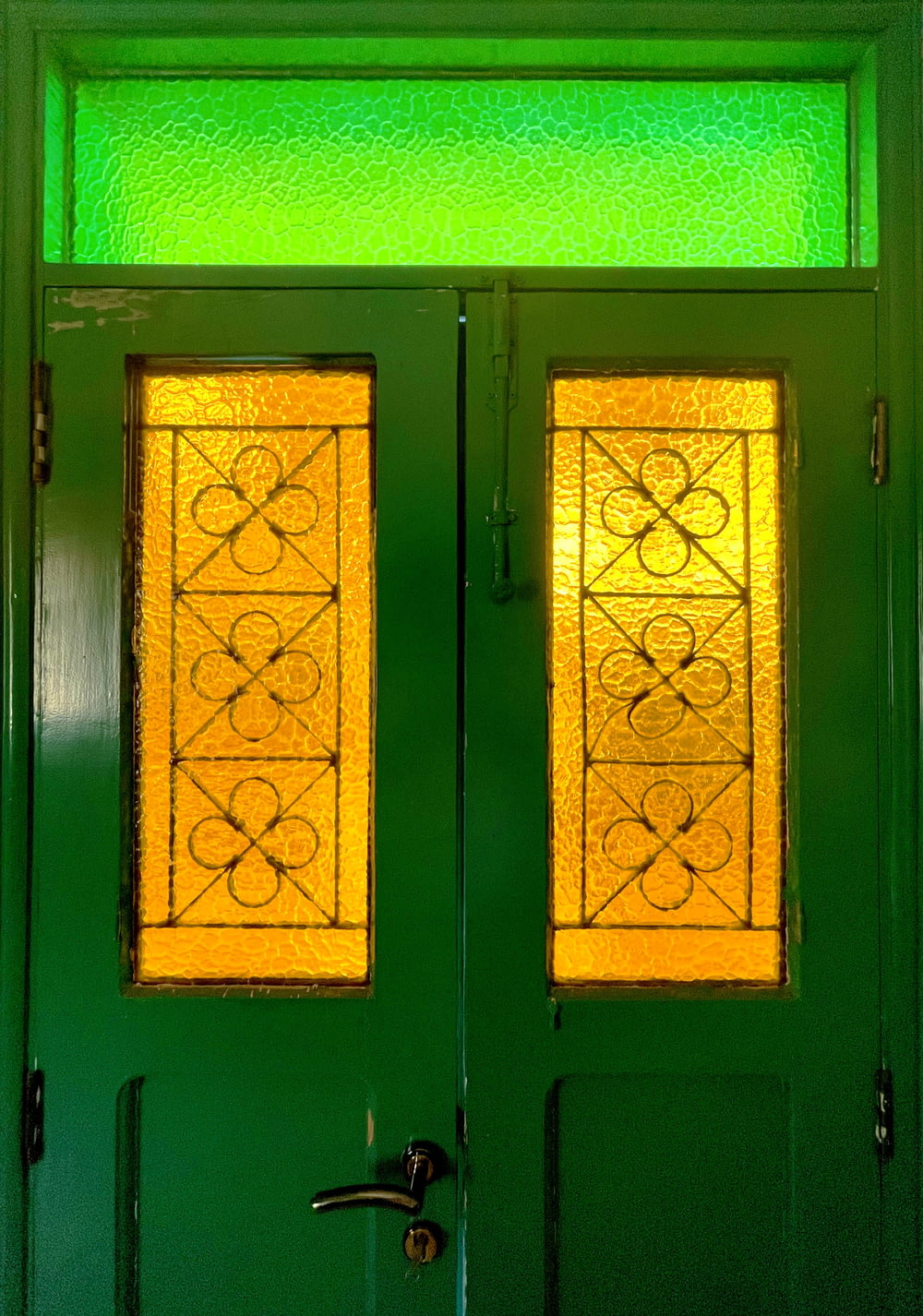 a couple of doors with a design on them