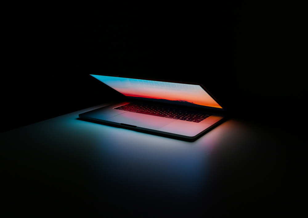 a laptop with a red light
