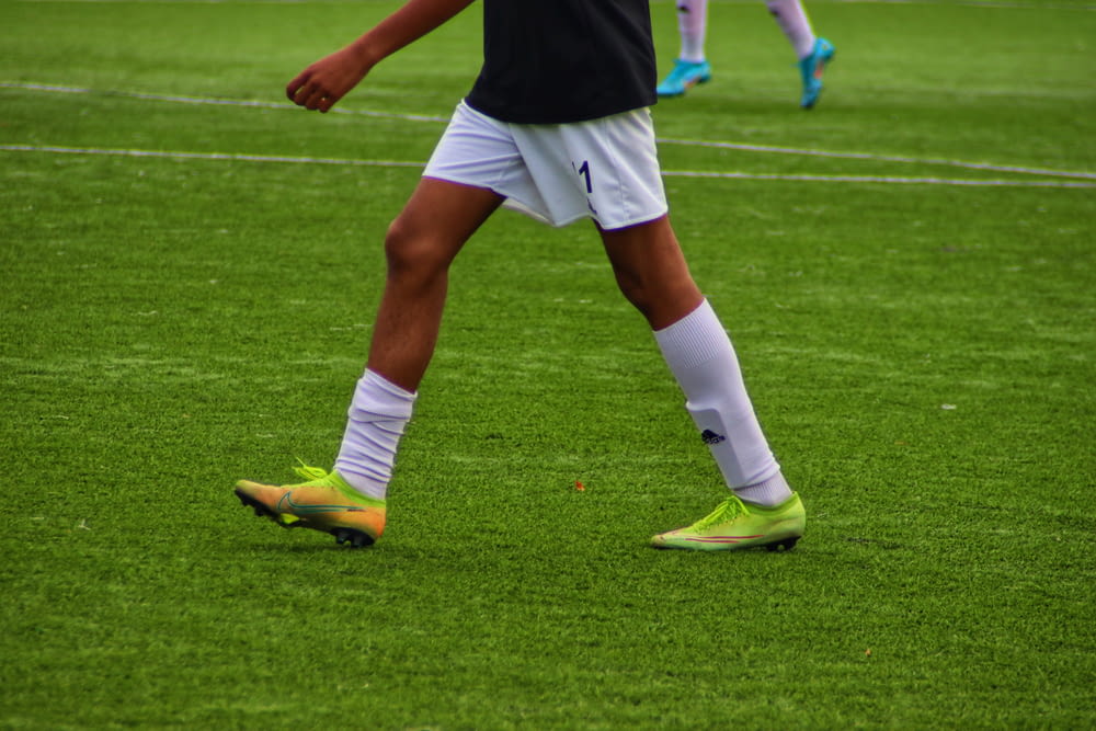 a person in white shorts on a field