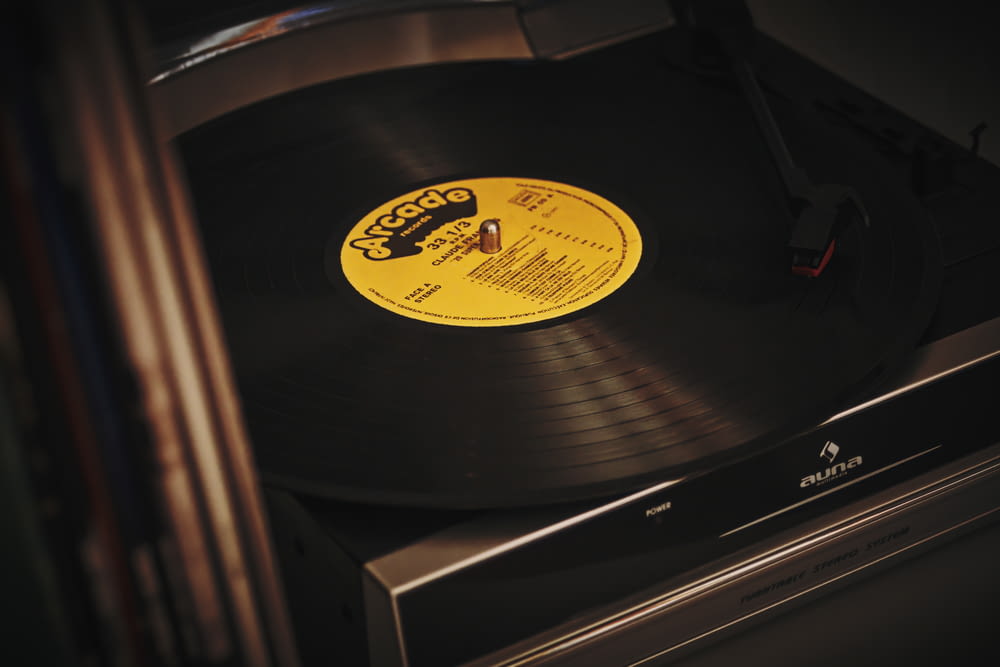 a black and yellow record player