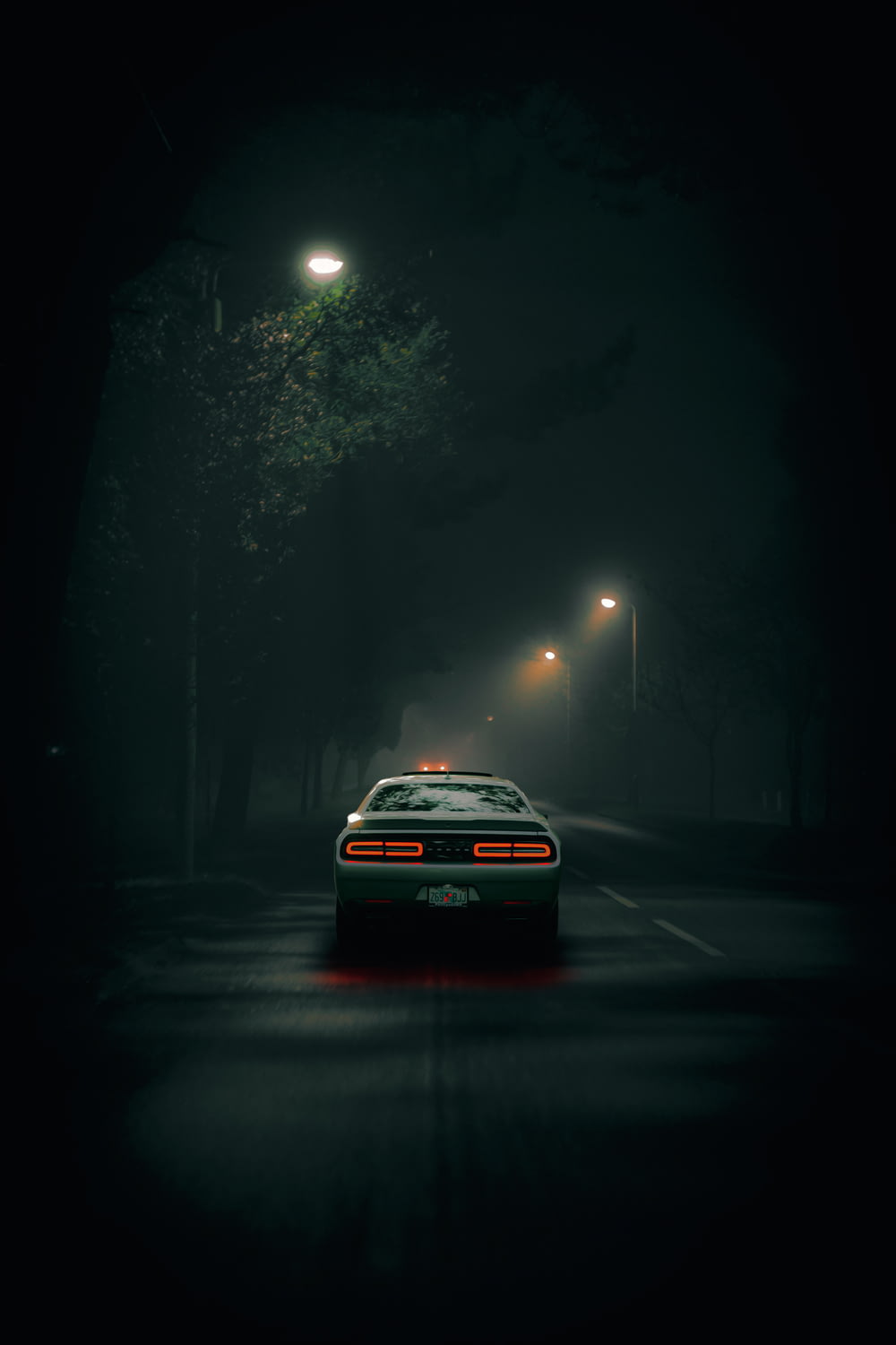 a car on a road at night