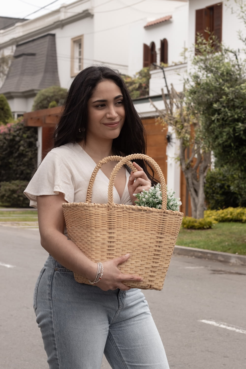 a woman holding a basket