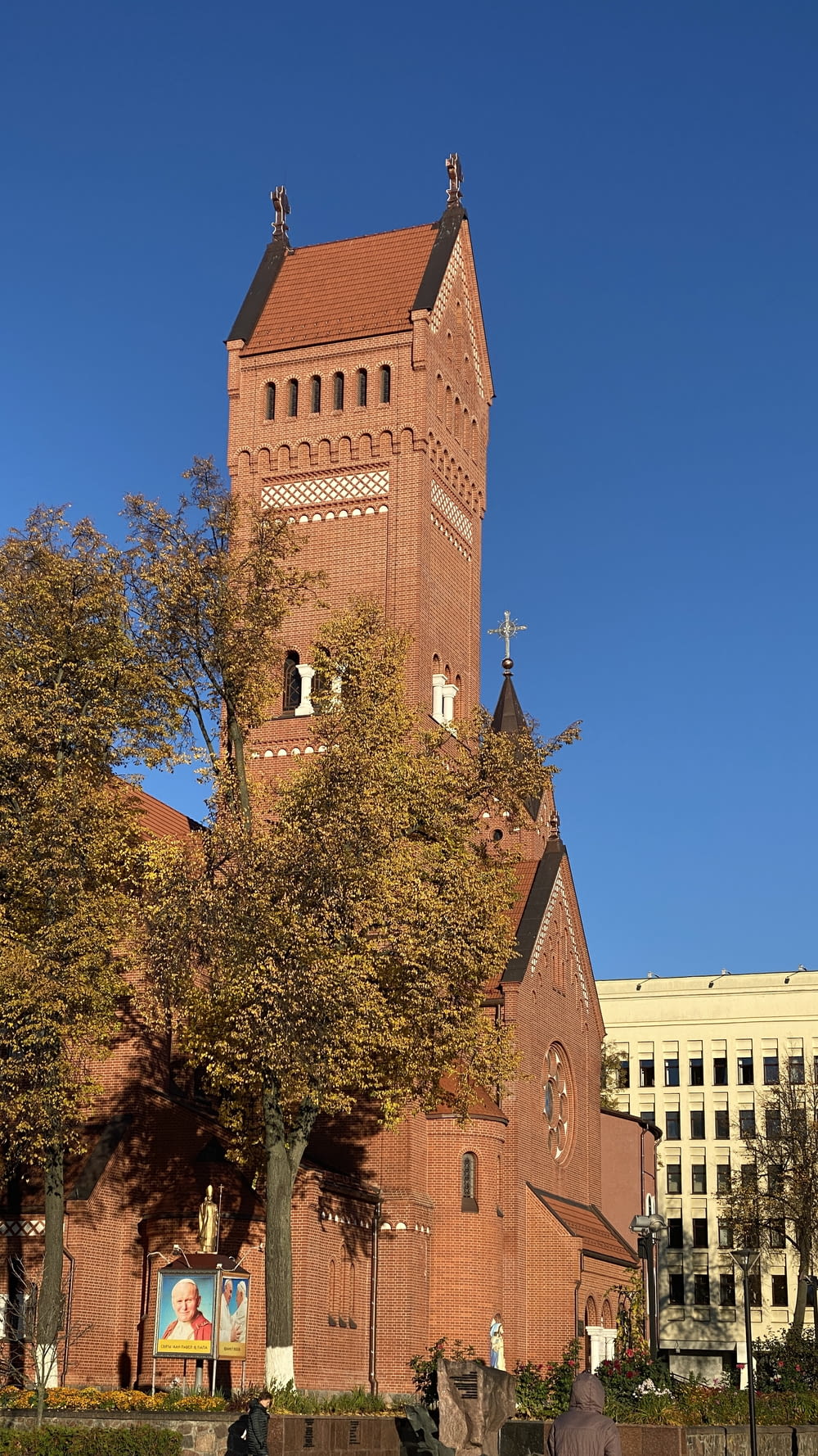 a tall brick building with a tower