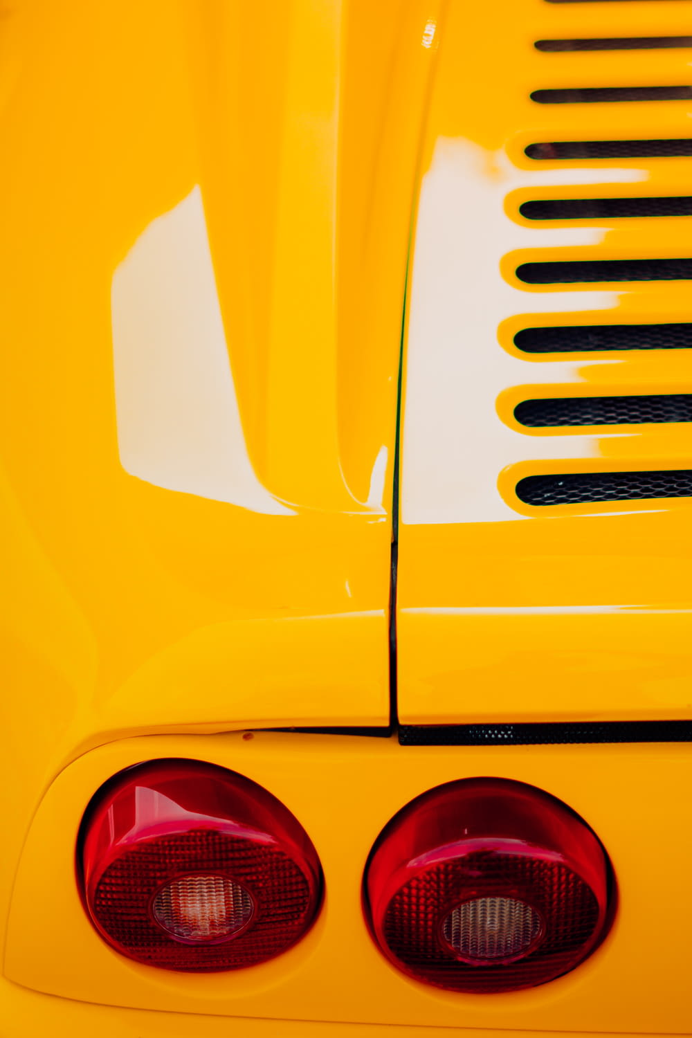 the front of a yellow car
