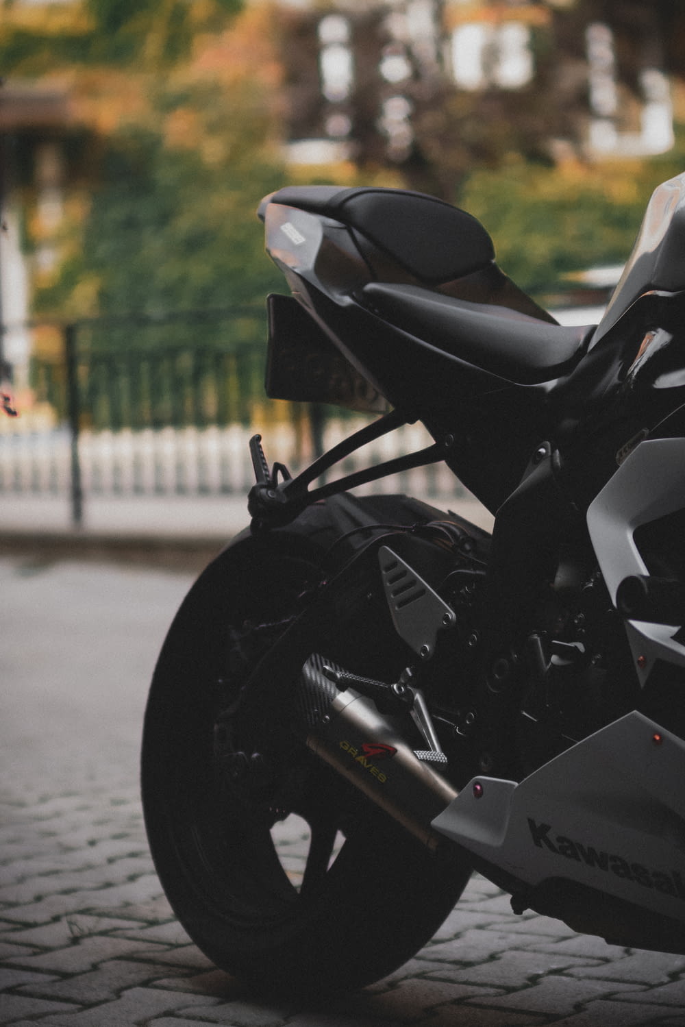a black motorcycle parked on a street
