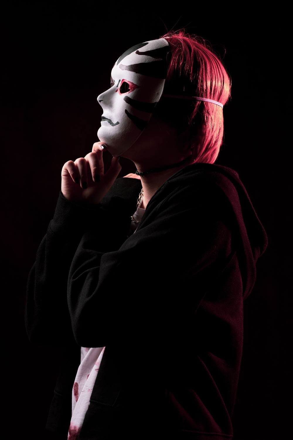a woman wearing a mask