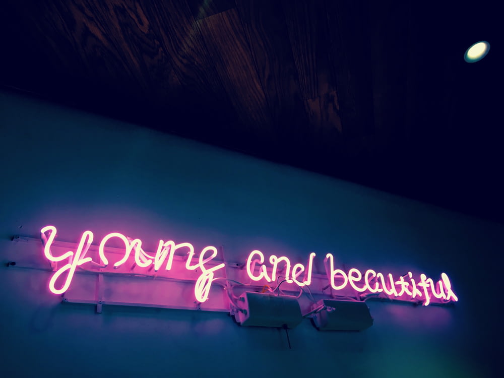 a neon sign with a word