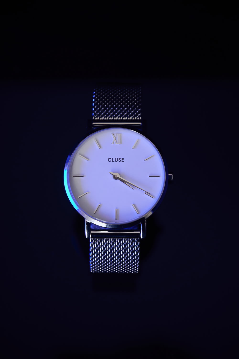 a watch with a blue face