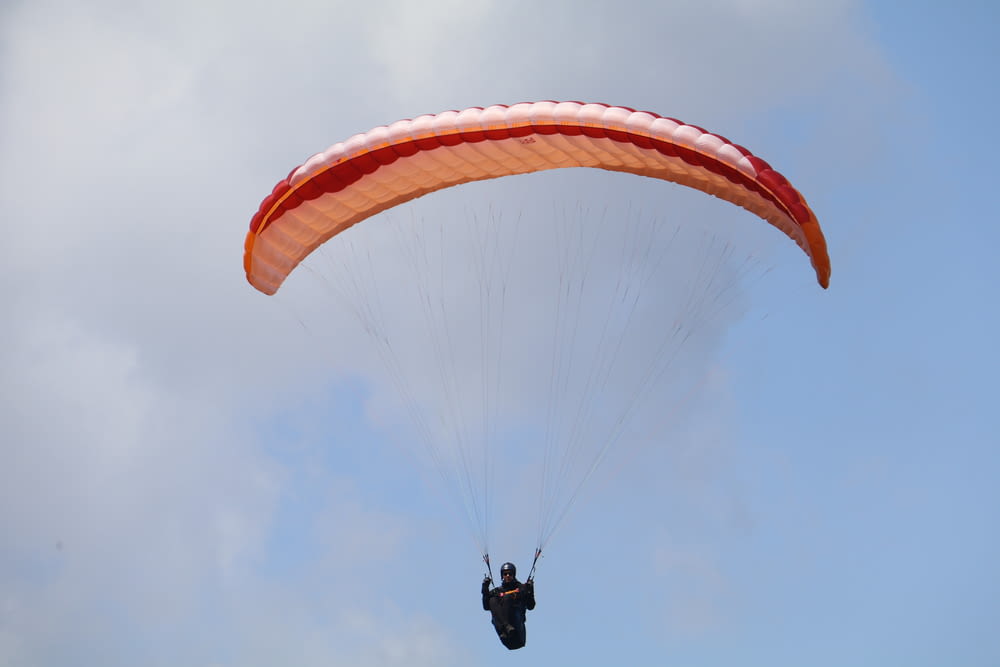 a person parachuting in the air