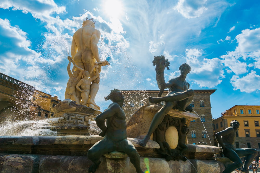 a fountain with statues